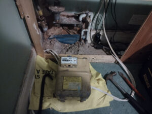 The meter, reluctantly removed.