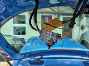 Wiring in the tailgate, showing the repair