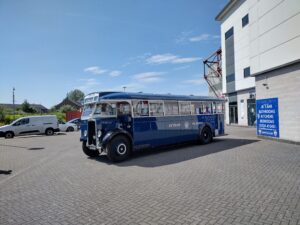Historic bus on display at Morecambe FC ground.