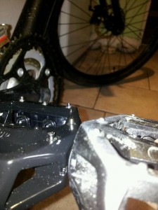 New pedal on left, fitted to bike.